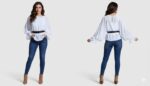 camicia bianca ampia con maniche a campana e una cintura nera